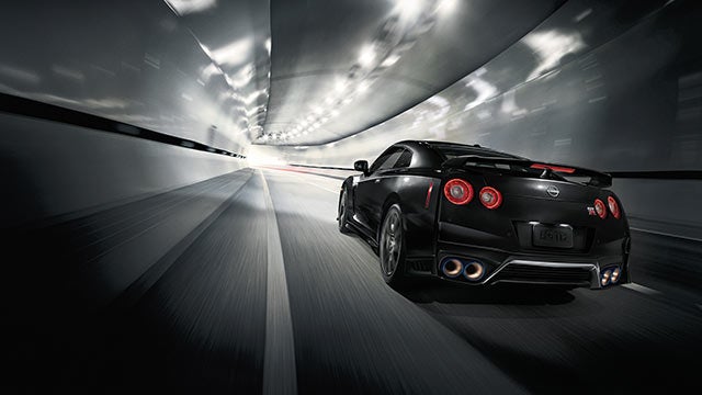 2023 Nissan GT-R seen from behind driving through a tunnel | Casa Nissan in El PASO TX