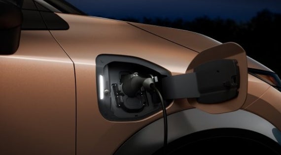 Close-up image of charging cable plugged in | Casa Nissan in El PASO TX
